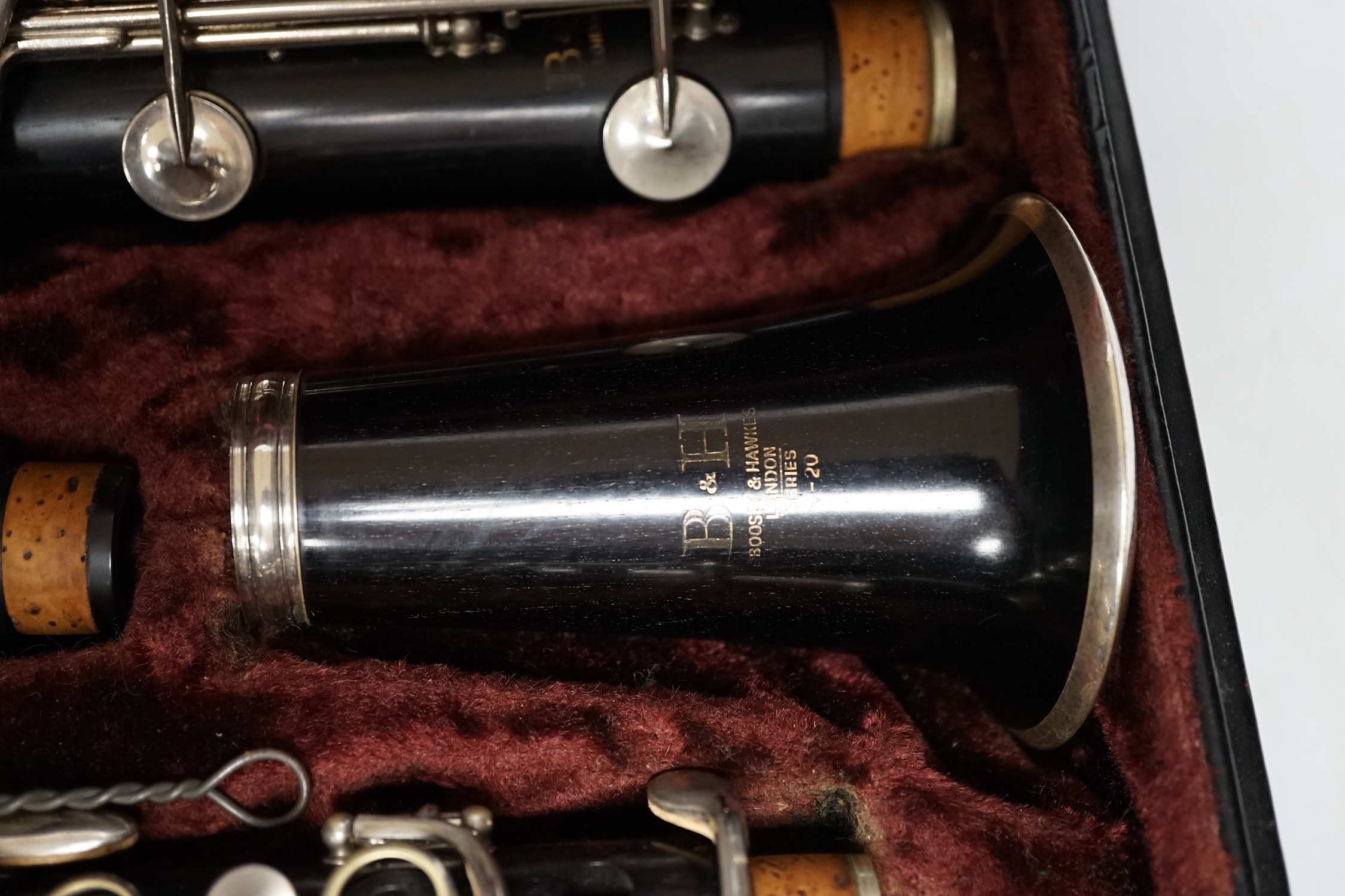 A cased Boosey & Hawkes 4-20 clarinet, in a fine original fitted leather case